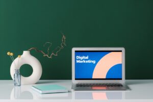 laptop, desk, vase, digital marketing